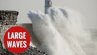 Large waves batter Porthcawl Lighthouse [upl. by Phillie]