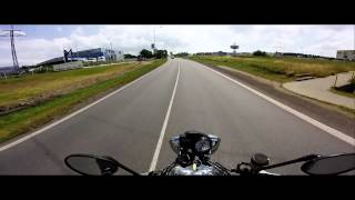 Triumph Speed Triple 955i  1st gear power wheelie [upl. by Nerty854]