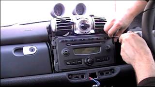 How to remove a smart fortwo 450 451 and Roadster stereo [upl. by Secnarfyram]