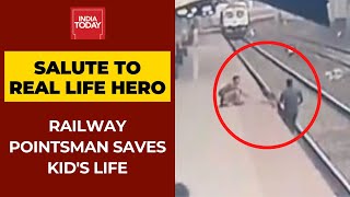 Alert Mumbai Railway Pointsman Saves Child From Getting Run Over By Train [upl. by Aicnelev]