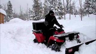 ATV Plowing 3 Feet of Snow Kawasaki Prairie 400 [upl. by Rick490]