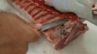 Demonstration desossage filet cote de porc [upl. by Aivatnahs652]