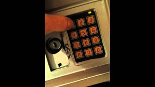 How to reset code on an electronic safe [upl. by Portingale]