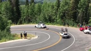 Cyclist racing downhill crashes into moving car [upl. by Euseibbob]