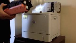 Changing the toner in the printer  HP Color Laserjet Enterprise [upl. by Ijuy]