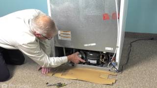 Whirlpool Refrigerator Repair  How to Replace the Condenser Fan Motor [upl. by Ciel]