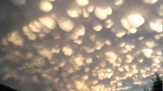 Mammatus clouds cotton ball clouds after storm in Regina  June 26 2012 [upl. by Ynohtnaed]