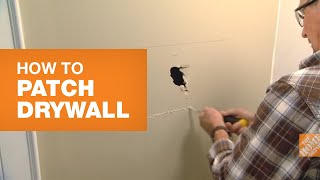 Drywall Repair Learn How To Patch Drywall [upl. by Ateekahs]